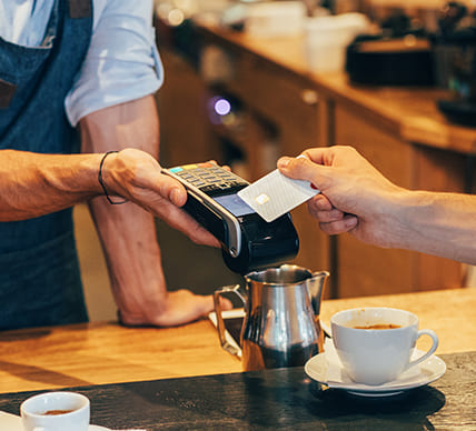 person using card at pos