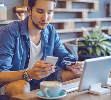 person using card on devices